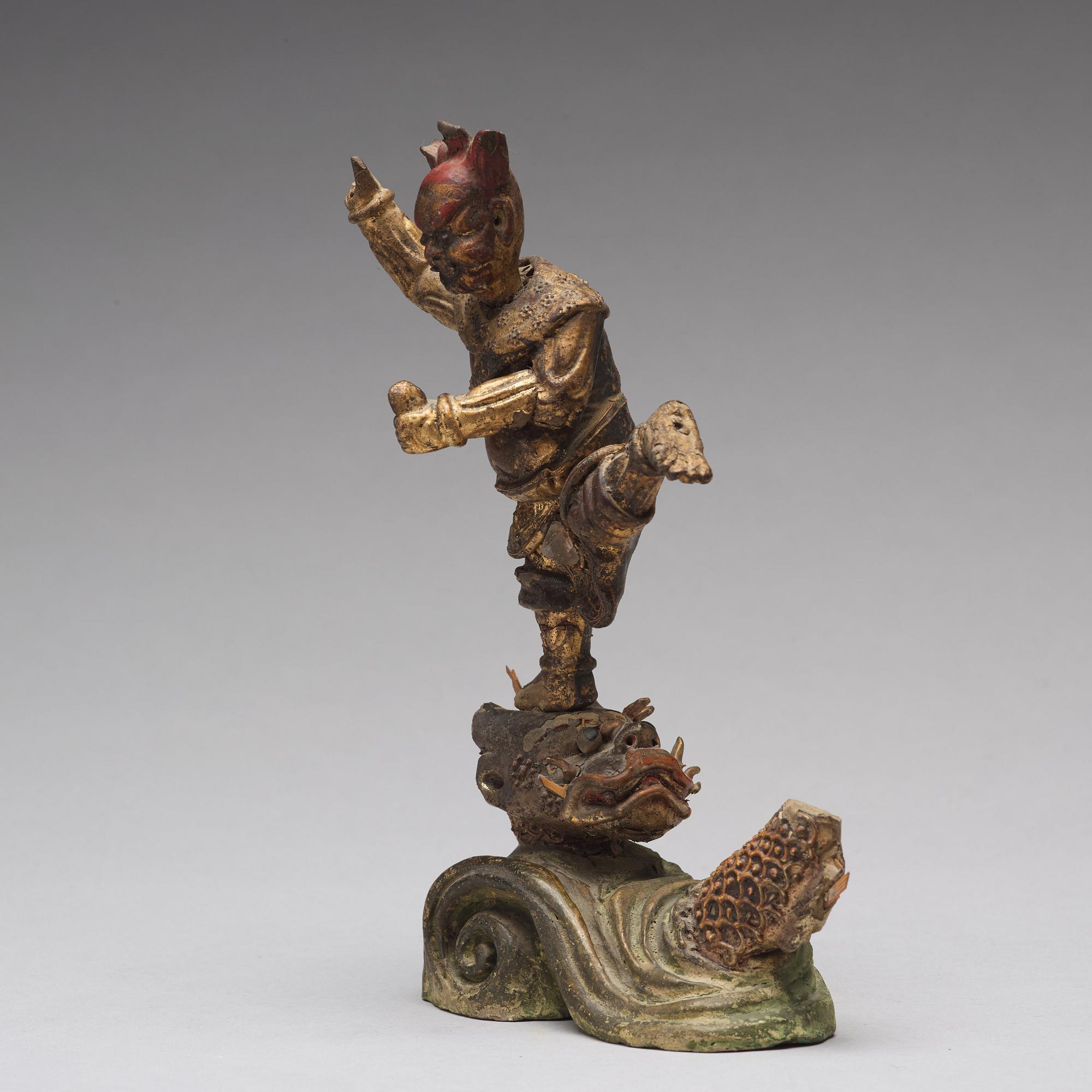A gilt lacquer sculpture of deity, Qing dynasty, 18th Century.