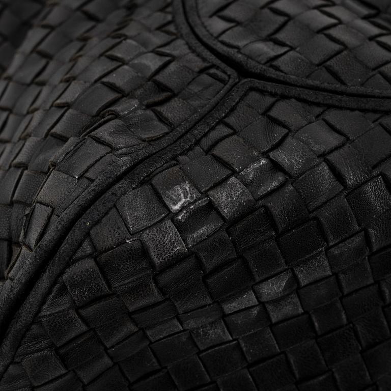 Bottega veneta, a black leather bag.
