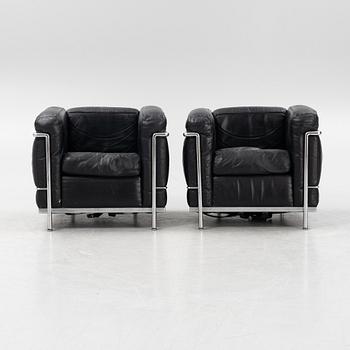 Le Corbusier, Pierre Jeanneret & Charlotte Perriand, a pair of 'LC2' easy chairs, Cassina.