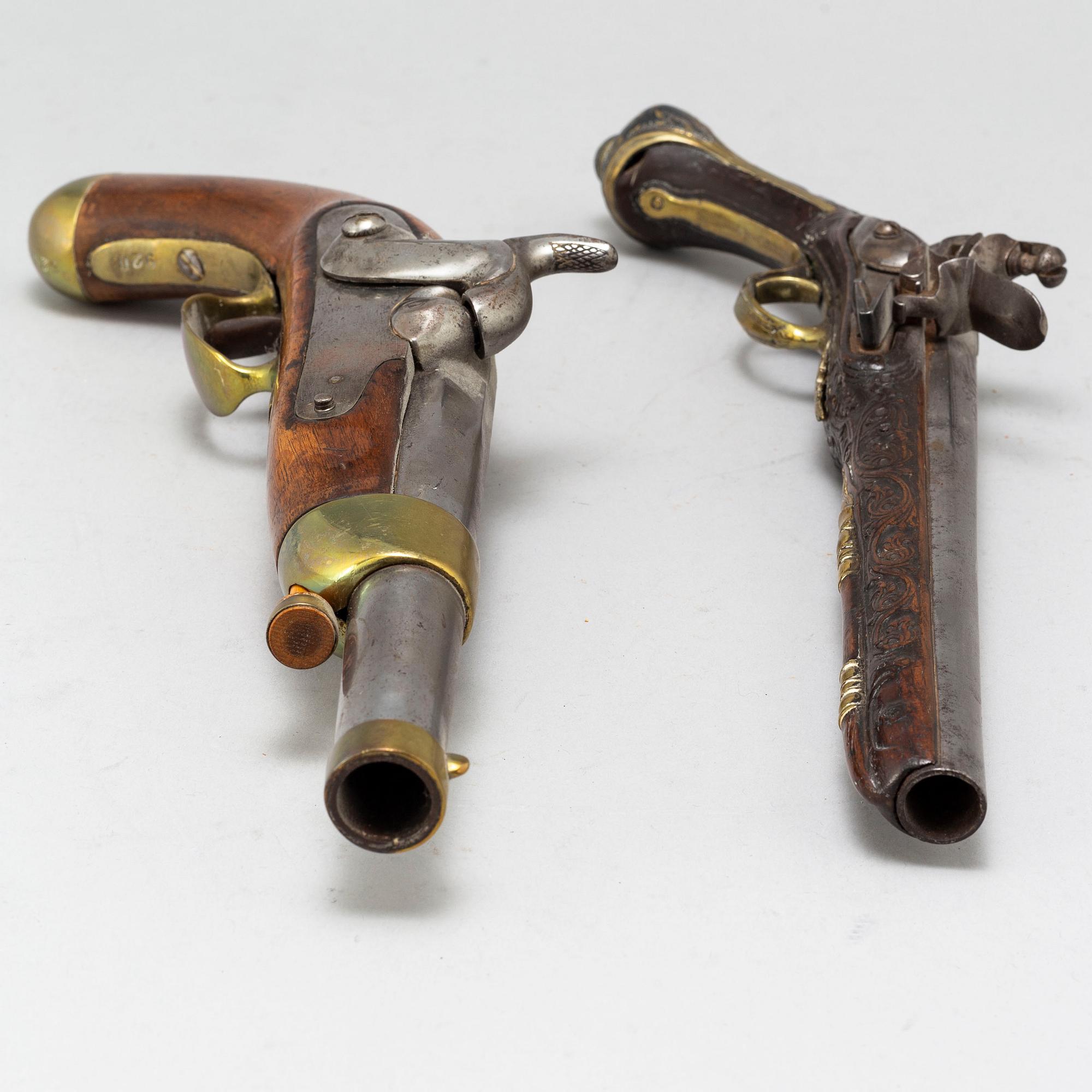 Two 19th Century pistols.