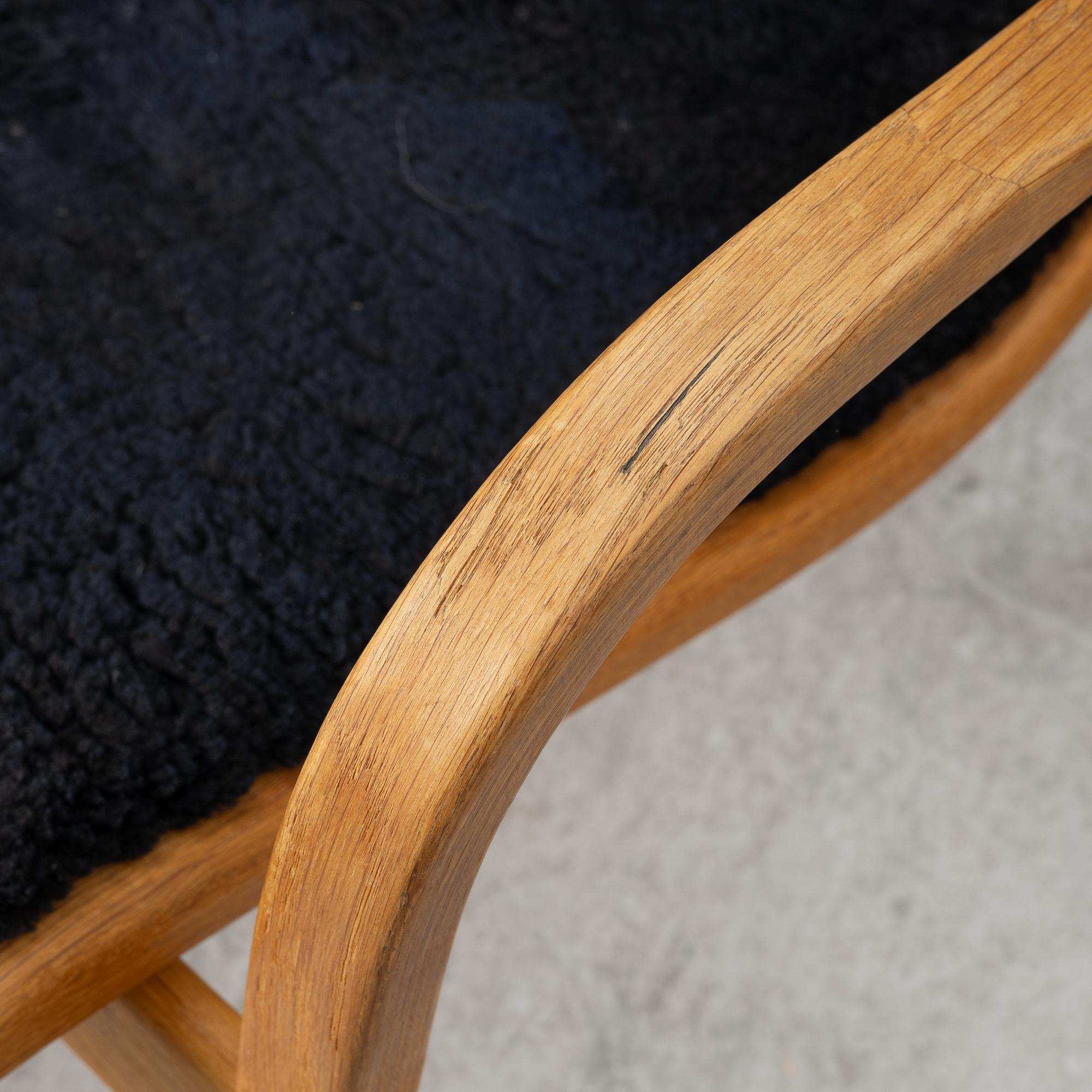 Yngve Ekström, a 'Lamino' armchair with ottoman, Swedese.