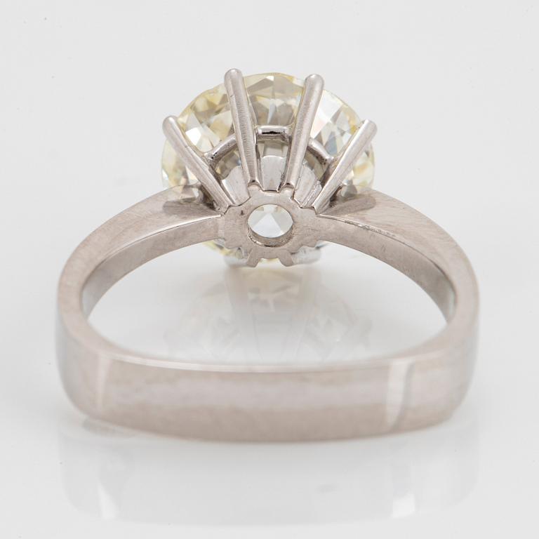A platinum ring set with an old-cut diamond weight ca 4.00 cts quality ca N/O si.