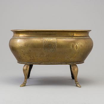 A 19th century brass jardiniere.