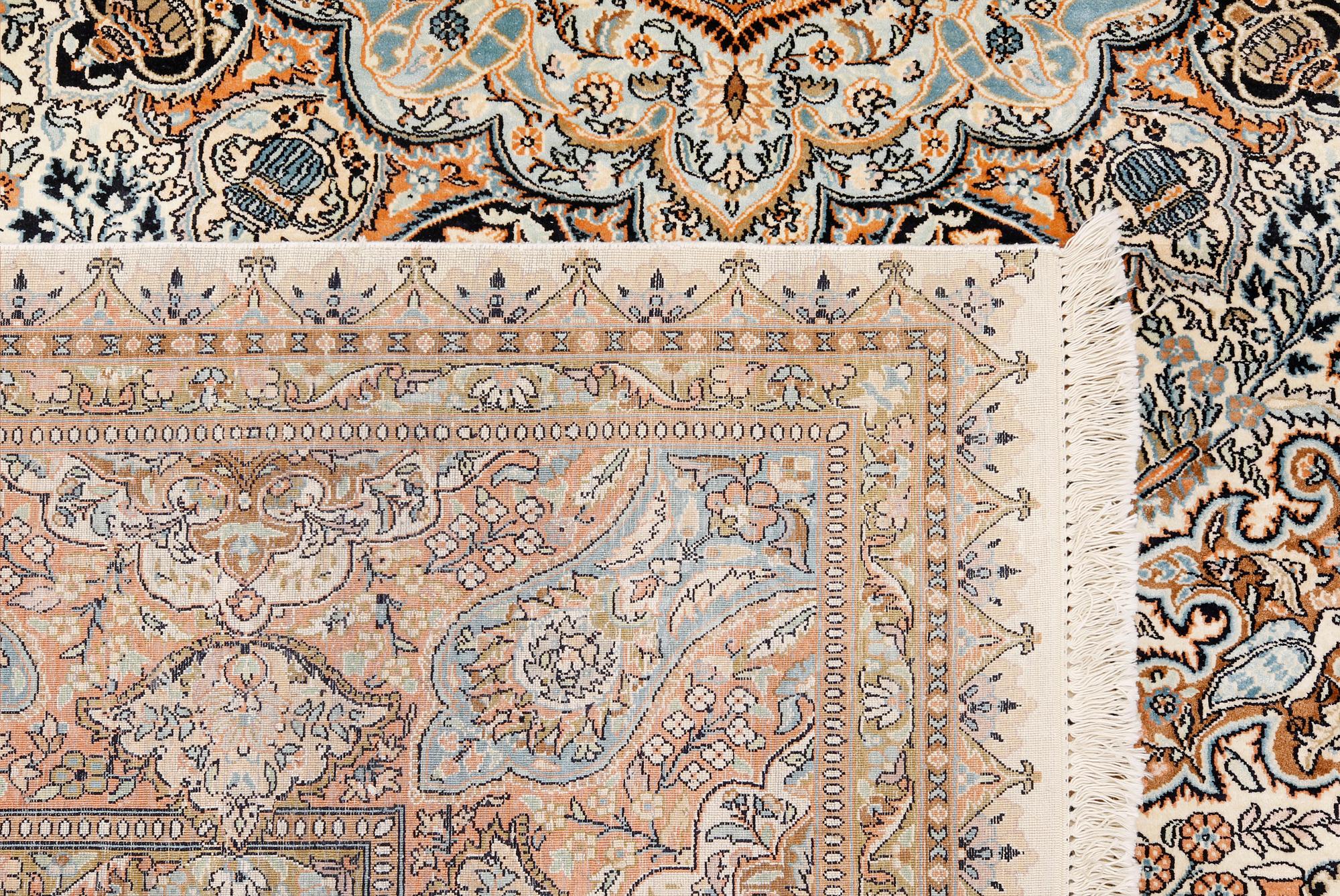 A silk carpet, Kashmir, approx. 377 x 269 cm.