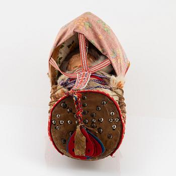 A Komsio, mid 20th Century.