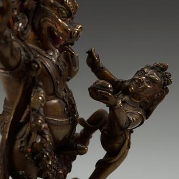 A Mongolian bronze figure of a Dharmapala, early 19th century.