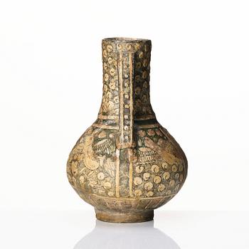 A central or northern persian pottery jug, probably 13th to 14th century.