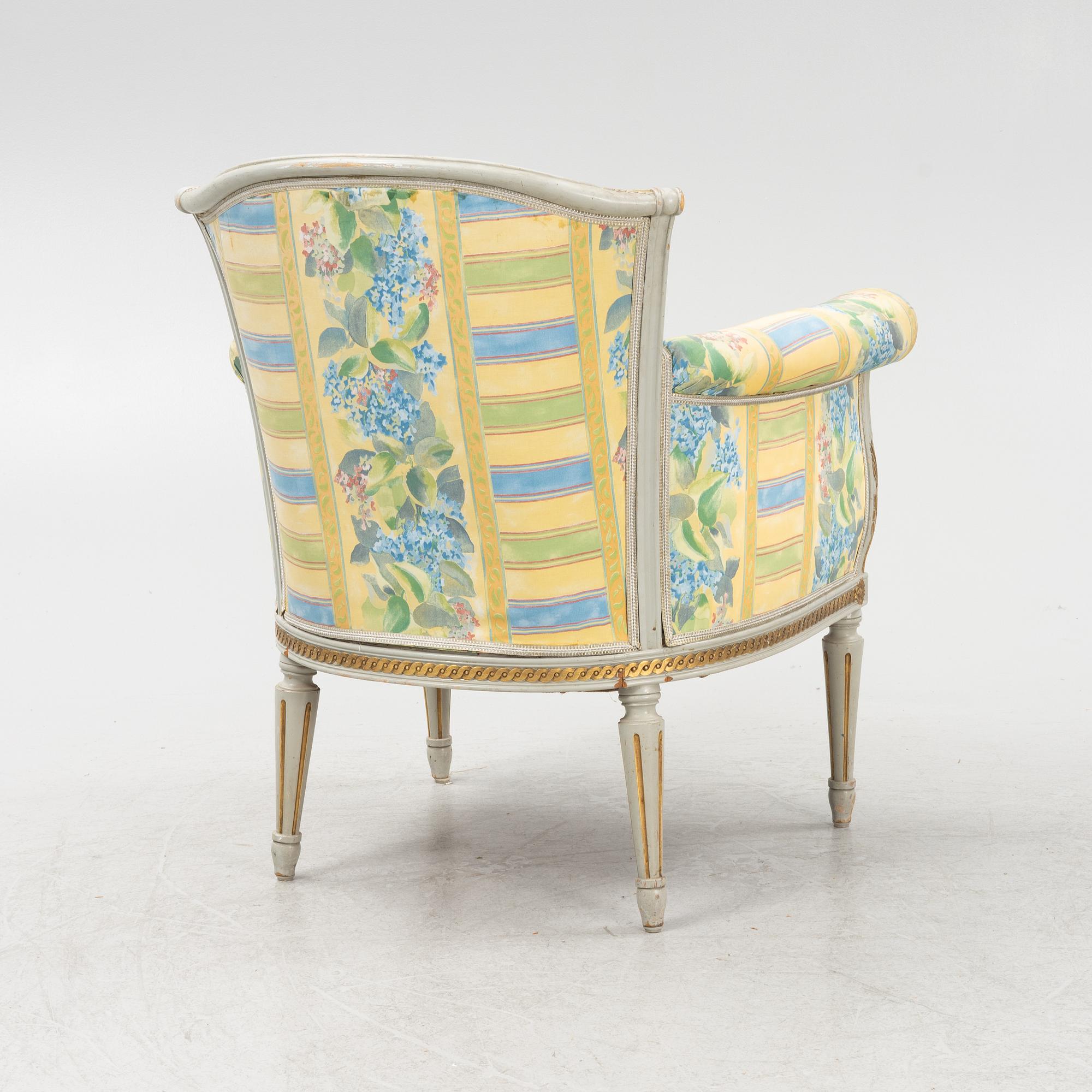 A Louis XVI style armchair, 20th Century.