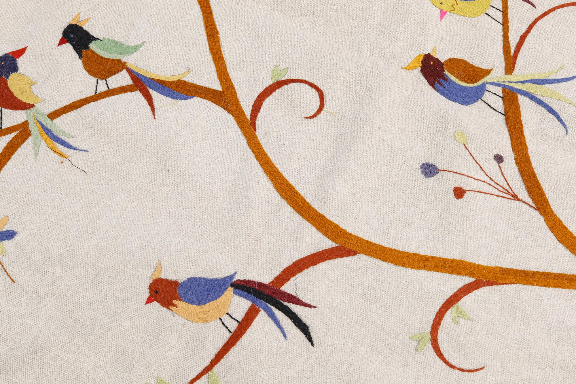 An embroided oriental flat weave carpet, circa 225 x 175 cm.