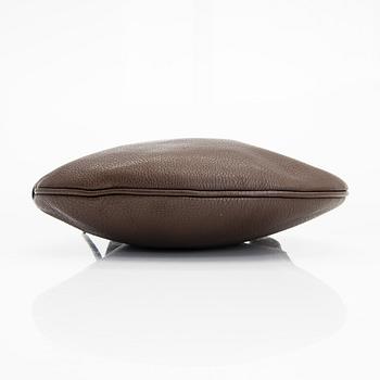 Fendi, a brown leather bag.