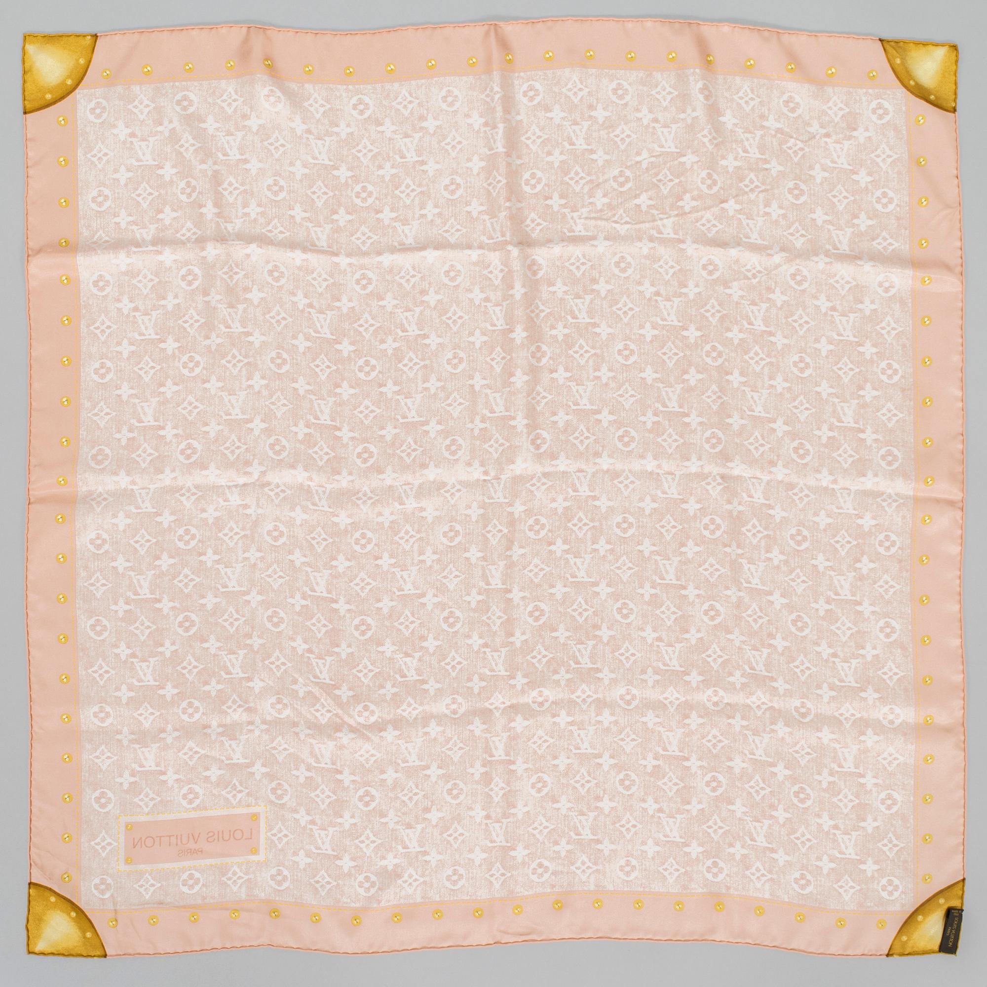 Louis Vuitton, a silk scarf.