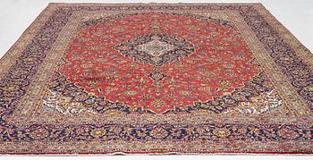 A Keshan carpet, central Iran, signed c, 392 x 301 cm.