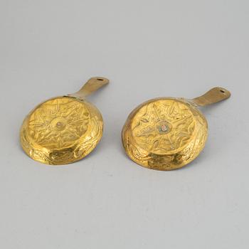 A pair of 19th century brass night light holders.