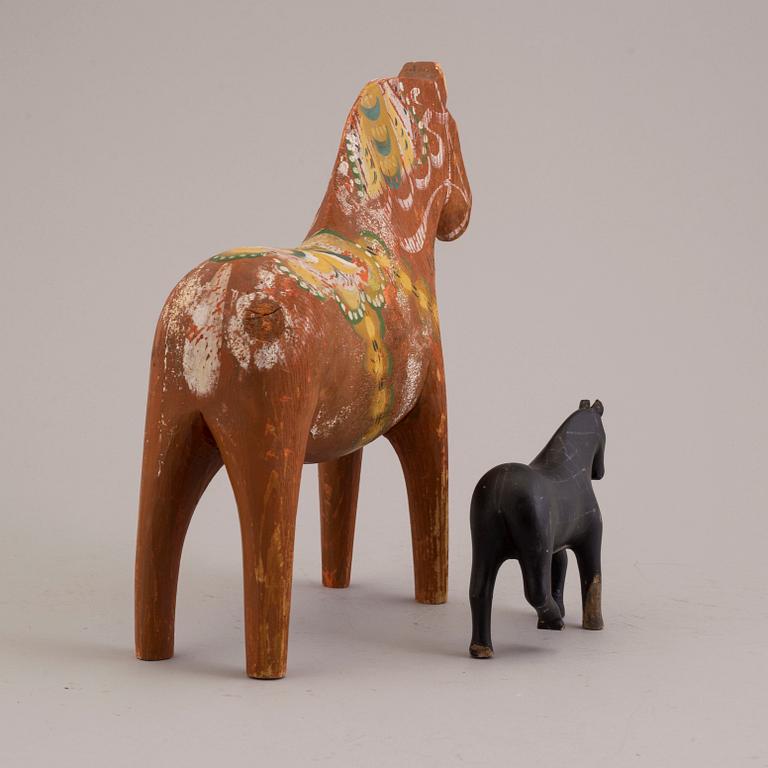 Two swedish wooden horses from the 20th century.