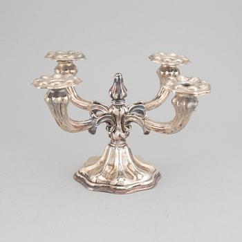 CG Hallberg, kandelaber samt ett par ljusstakar, silver, rokokostil, Stockholm, 1936 och 1935.