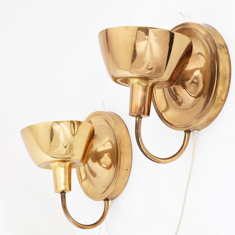 a pair of 'model 2389' wall lights for Svenskt Tenn, Sweden.