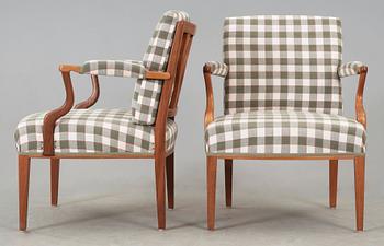 A pair of Josef Frank mahogany armchairs, Svenskt Tenn Sweden.