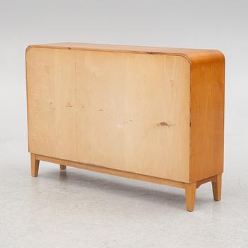 A Swedish Modern bookcase, 1940s.