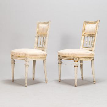 A pair of gustavian chairs made in Lindome by Johannes Andersson (1763-1840), signed IAS+, around the year 1800.