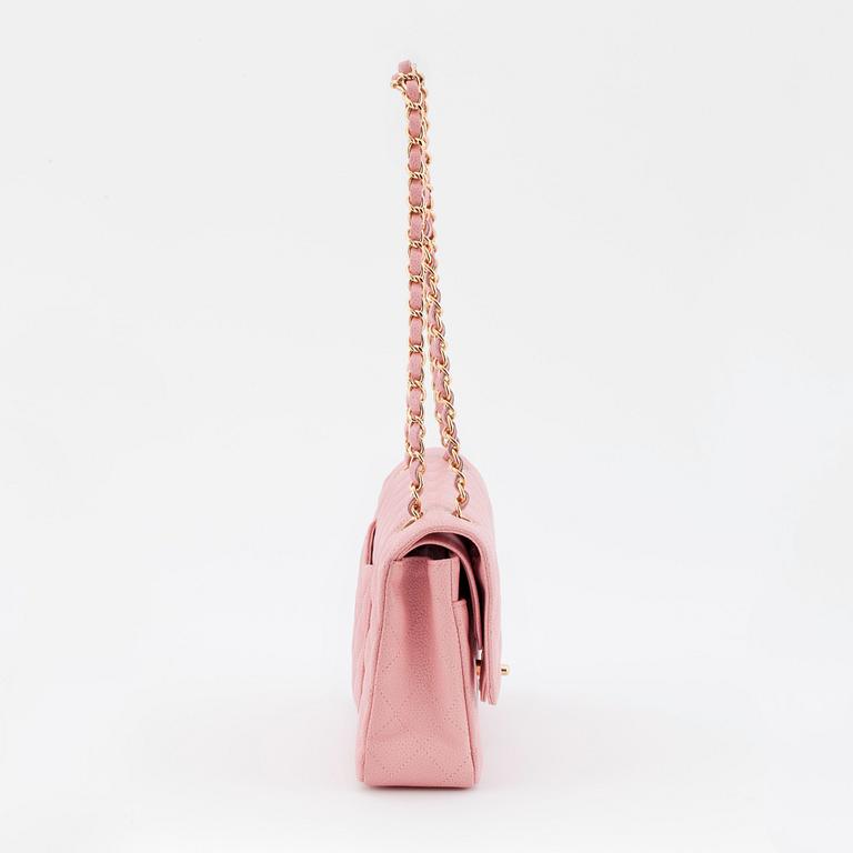 CHANEL, a pink caviar leather "double flap" shoulder bag.