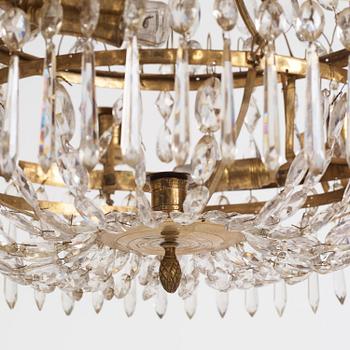 A late Gustavian nine-light gilt brass and cut glass chandelier, Stockholm, late 18th century.