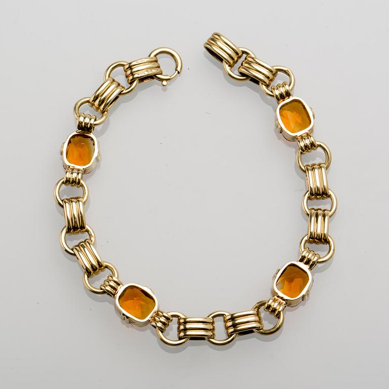 ARMBAND, 14 K guld med citriner, ca 9.00 ct. Vikt ca 16 g.