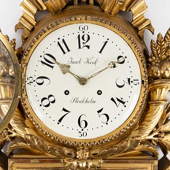 A gilt Gustavian wall clock, Jacob Kock (Royal Clockmaker in Stockholm 1762-1803).