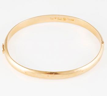 ARMRING, 18K guld, Ossner & Larsson, Göteborg, 1958. Vikt 30,5 gram.