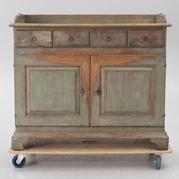 A 19th century sideboard.
