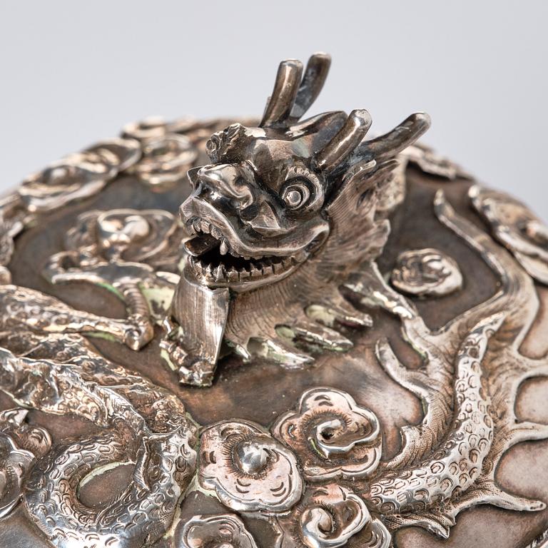 A Chinese Silver Dragon Bowl, mark of Wang Hing & Co, active c 1854-1925.