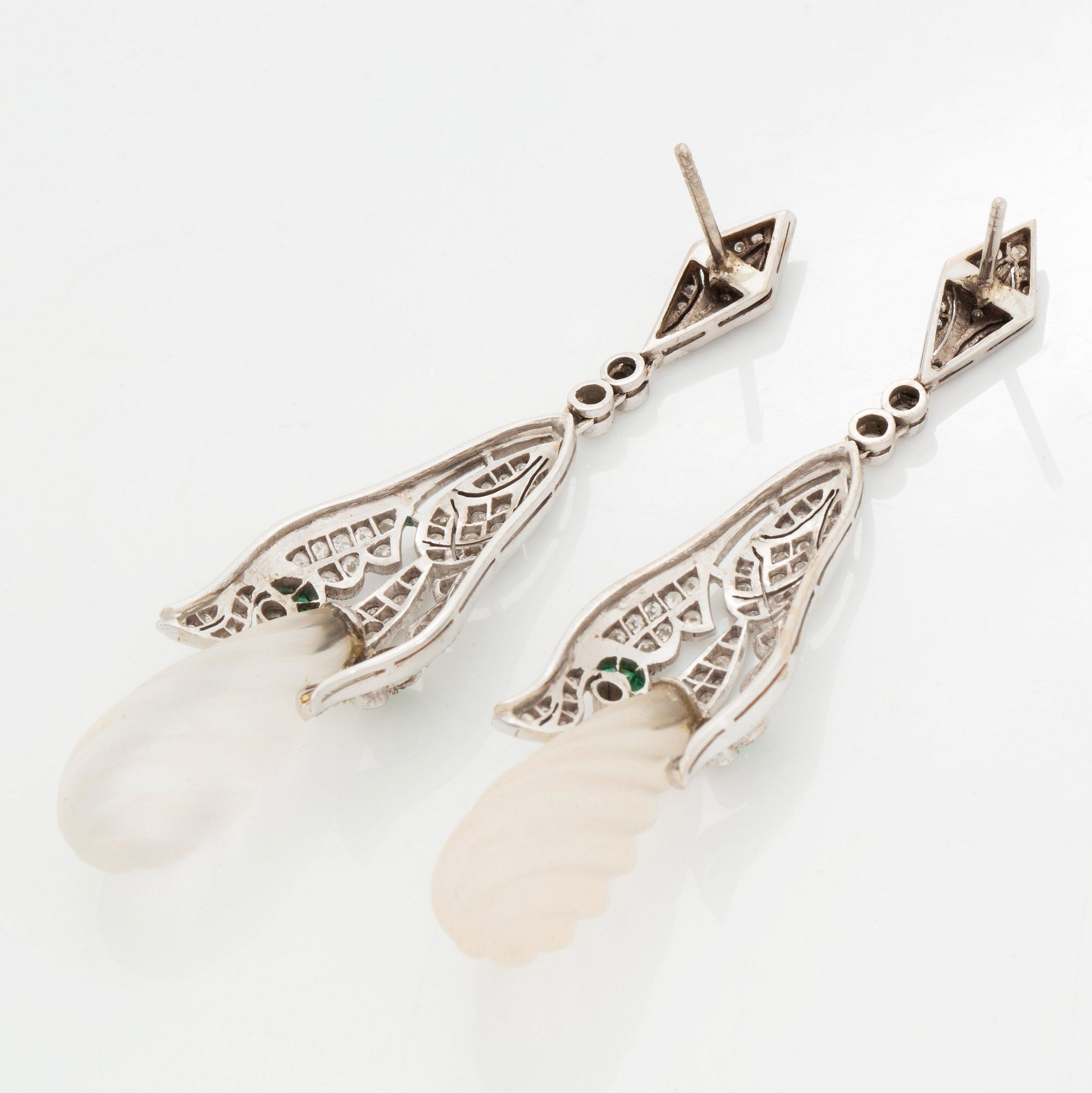 A pair of 18K white gold earrings with rock crystal drops.