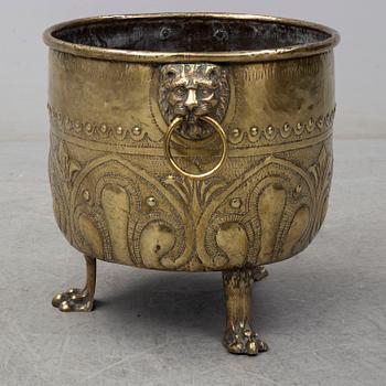 An 18th century brass flower pot.