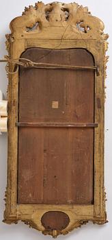 A giltwood rococo mirror, Stockholm, later part 18th century.