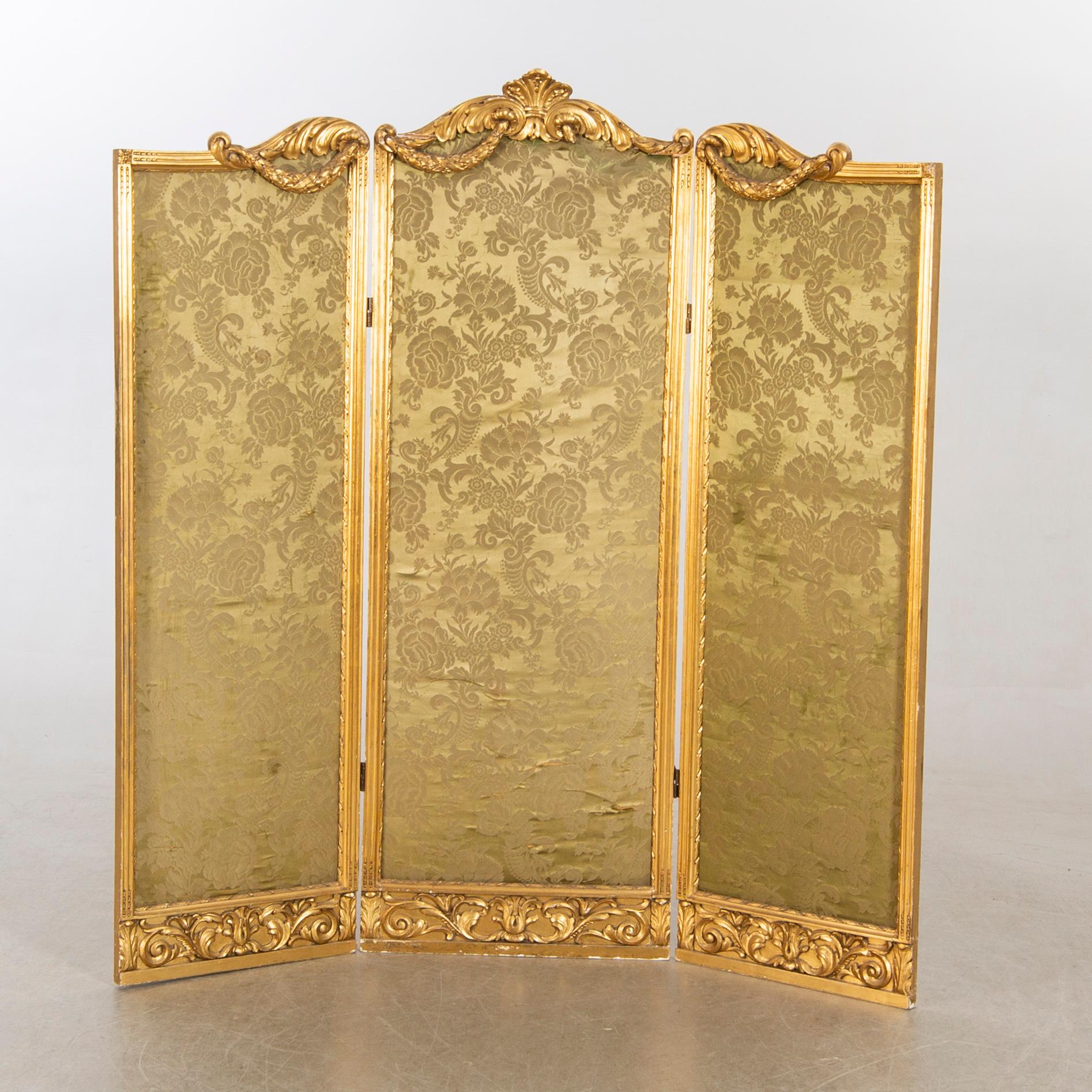 A Louis XVI-styel folding screen beginning of the 20th century.