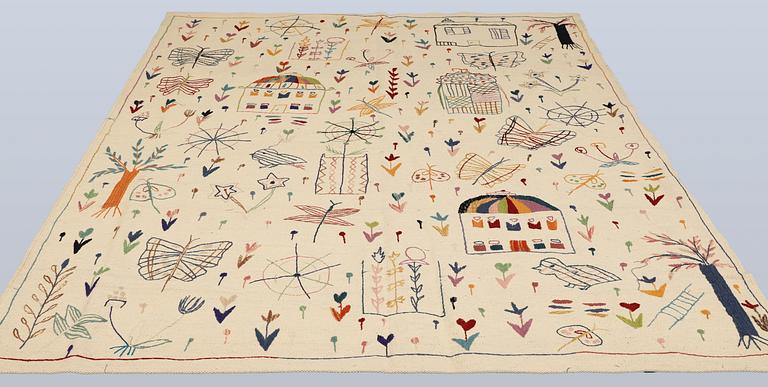 A hand-embroidered Kilim rug, approx. 244 x 180 cm.