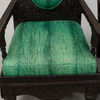 A pair of Angloindian carved chairs, India, 19th century, in so called 'Bombay style'.