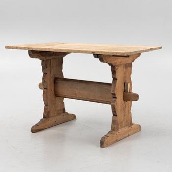 A pine trestle table, 19th century.