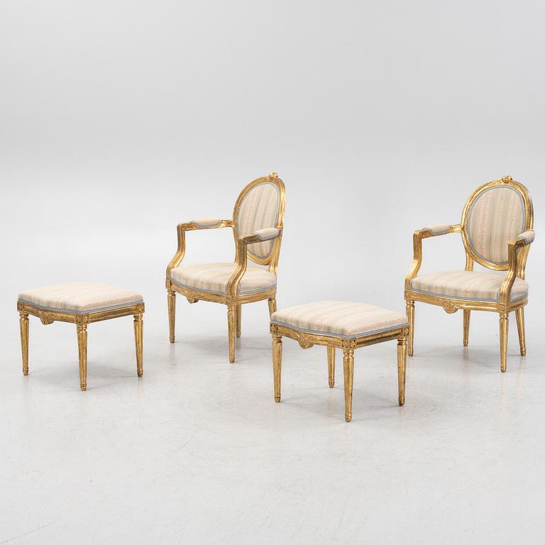 Pair of armchairs with ottomans, Louis XVI style, first half of the 20th century.
