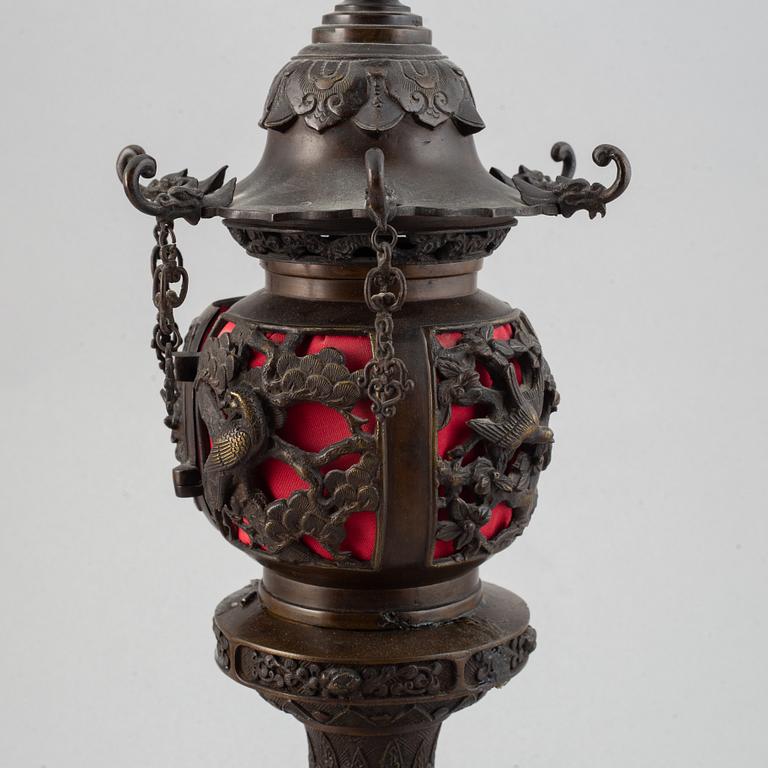 A Japanese bronze lantern, circa 1900.