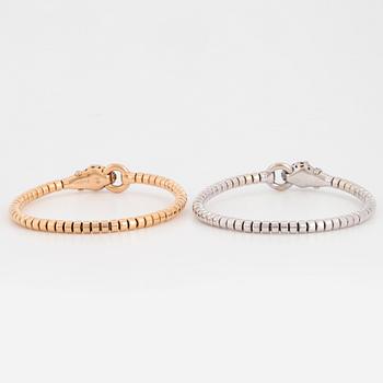 Two panther stretchy white gold and rosé gold with brilliant-cut diamonds.