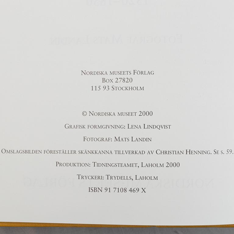 Collection of literature on silver, 8 volumes, including 'Svenskt silversmide 1520-1850'.