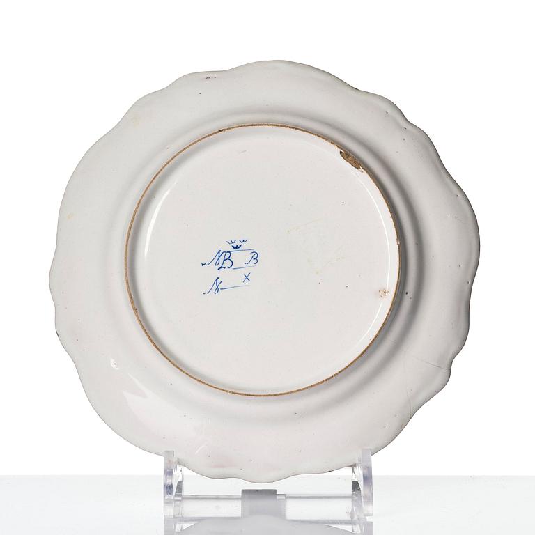 A Swedish Marieberg faience dinner plate, 18th century.