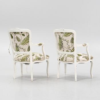A pair of Rococo style armchairs, 20th century.