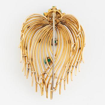An 18K gold brooch set with turquoises, old-cut diamonds and green quartz.