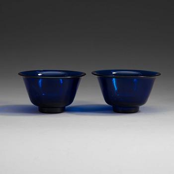 Two blue Peking glass bowls, late Qing dynasty.
