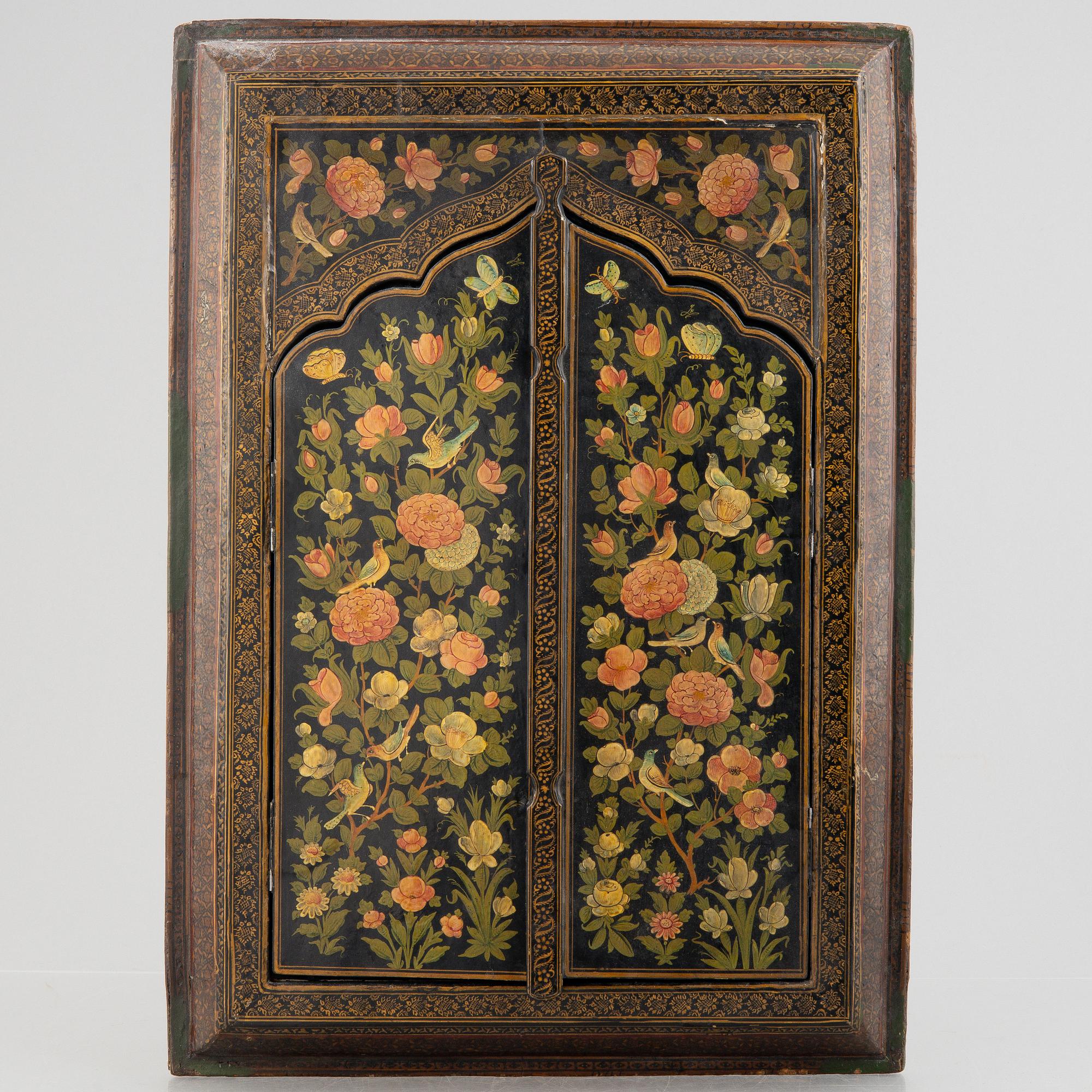 A Persian papier-maché mirror, first half of the 20th century.