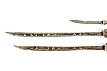 A set of three Burmese 'Dha' swords, late 19th /early 20th Century.