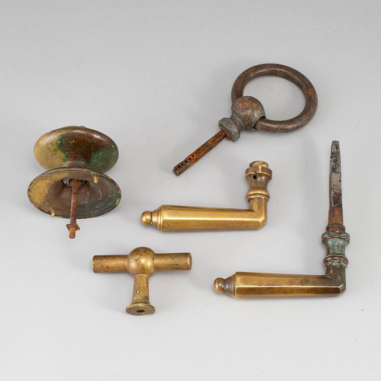 Five bronze door handles, 19th/20th century.