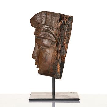 A wooden sculpture presumably Baroque around year 1700.