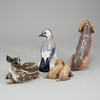 A group of four porcelain figurines of animals, incl. Royal Copenhagen and Rörstrand.